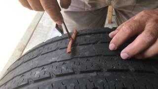 Como reparar una llanta ponchada por un clavo o tornillo