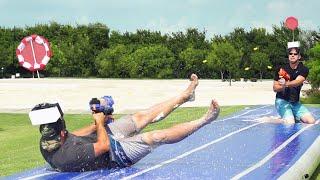 Nerf Slip and Slide Battle | Dude Perfect