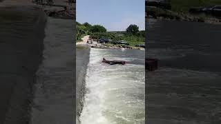 tricycle drifted across the river