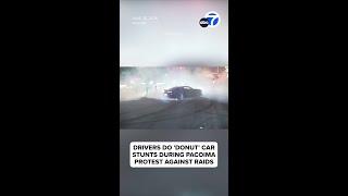 Drivers do stunts, fireworks go off during protest against immigration raids