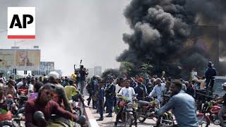 Protesters in Congo rally behind President Félix Tshisekedi as others flee to Rwanda