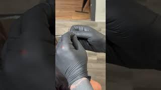 Explaining how thread less titanium body jewelry works to my client. #titaniumjewelry #bodyjewelry
