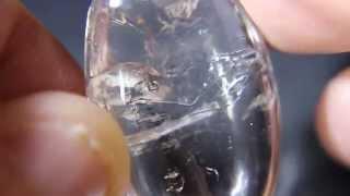 MOVING AIR BUBBLE INCLUSION IN QUARTZ