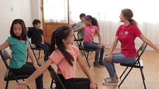 Chair Yoga For Slowing Down | 10 Minute Kids Yoga Class with Yoga Ed. | Ages 3-12