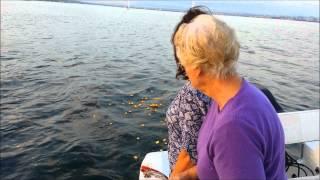 Burial at Sea With Basket Service At Sunset