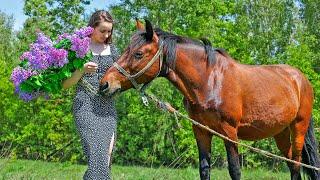 Ukrainian girl in the village, Traditional Ukrainian Okroshka, slow day and cooking a light lunch