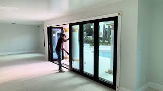 15-foot wide aluminum ALUPROF MB-86 folding door system installation Grand Visions Doors & Windows