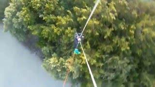 Kite boarder jumps trees and jibs the top!