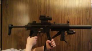 MP5 H&K by Walther with Aimpoint Pro Red Dot, Customized Foregrip and Tactical Light+Laser