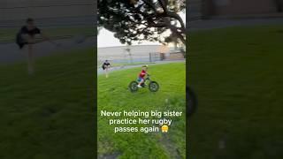 Never helping big sister practice her rugby passes again!  #rugby #siblings #kidsonbikes