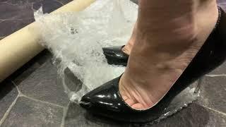 Black patent metal heels from a Dune vs bubble wrap