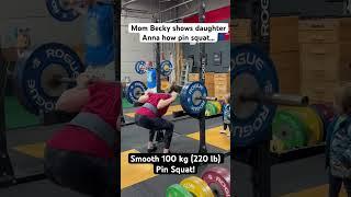 Mom shows baby girl how to pin squat | #strongwomen #strongmom #supermom #shorts  #powerlifting