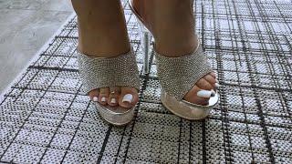 Sexy mules. High heels. White long toenails and fingernails.