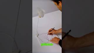 Зажигает лампу карандашом 