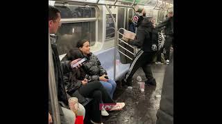 Guy drops drink tray on subway and falls