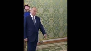Putin entering hall to greet Tajikistani President Emomali Rahmon