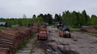 Скоростная разгрузка сортиментовоза - short logger rapid unload TIMELAPSE