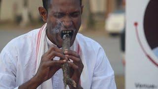 Man Eats 1 Kilo of Burning Charcoal for World Record