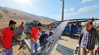 A nomadic family in the village.  Buying construction materials for the Javad family