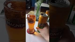 Pouring a can of Magners Original Irish Cider into a Magners Pint Glass