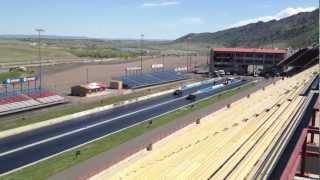 2006 Porsche Cayenne Turbo S vs. Dodge Challenger at Bandimere Speedway