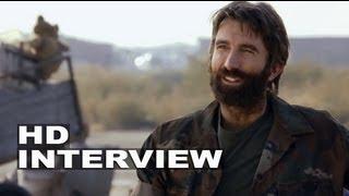 Elysium: Sharlto Copley "Kruger" On Set Interview | ScreenSlam