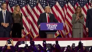 Donald Trump speaks at election night party flanked by family and friends