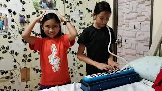 Ate Danica plays melodion