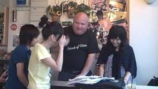 Pastor Ken on Oct 12 at  Mongkok at The Comma Cafe singing with new friends!