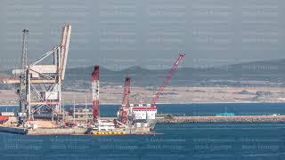 Aerial view of container cargo terminal of commercial port timelapse, business logistics and