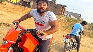 Tug of war RX100 vs Dirt bike