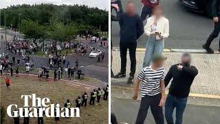 Asylum seekers film rioters making threatening gestures as they surround Rotherham hotel