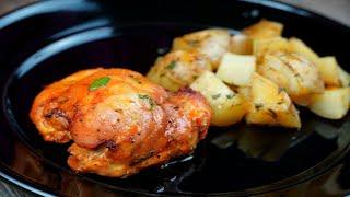 Oven Roasted Boneless Chicken Thighs Over Potatoes | EASY One Dish Dinner Recipe