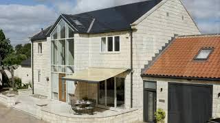 New build with panoramic glazing & bi-folding doors