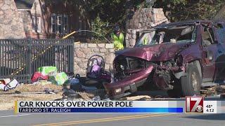 Car knocks over power pole in Raleigh