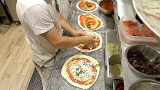 Delicious Neapolitan pizza in Rome in the "Mangianapoli" pizzeria - Street Food Italy - Rome food