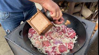 A dish that will conquer everyone, meat in a Kremlin style in a cauldron on the fire