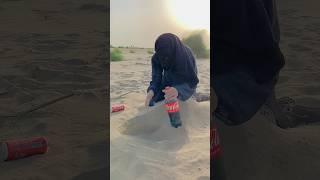 Extracting Cold drinks  from desert sand 
