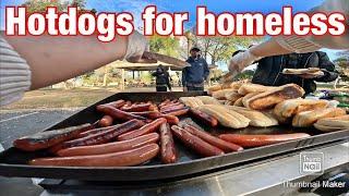 Cooking hot dogs for the homeless people at the park!