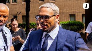 Chris Brown leaves London Southwark Crown Court after pleading not guilty to ‘bottle attack’ charge