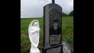 Памятник с Ангелом и Иконой Николая Чудотворца.