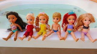 Elsa and Anna toddlers pool party and challenges