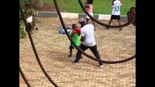 Bobi Wine teaches his kids how to fight