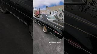 Caddy on Gold Thangs from Oakland, Ca