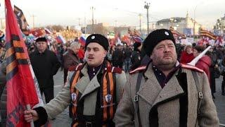 Putin joins celebration marking takeover of Crimea