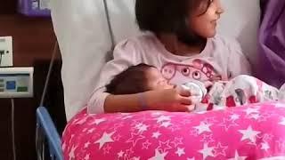 when mishka met her younger brother for first time... adorable video newborn