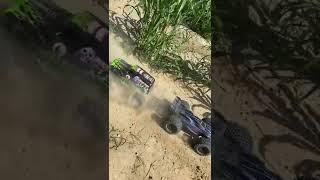 Grave Digger SMT 10 vs JLB CHEETAH RC CAR