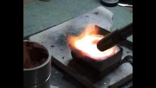 Melting silver and casting a ring using delft clay