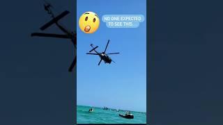 Military #helicopters a few meters away from the floating people, #incredible #beachlife #crazy