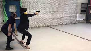 Israeli Parliament member practices pistol firing